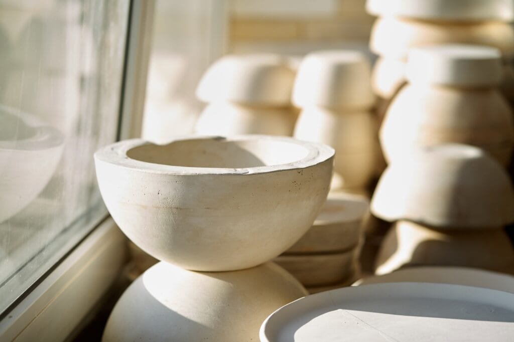 Manufacture of ceramic products, workpiece. Beautiful background with ceramic pieces