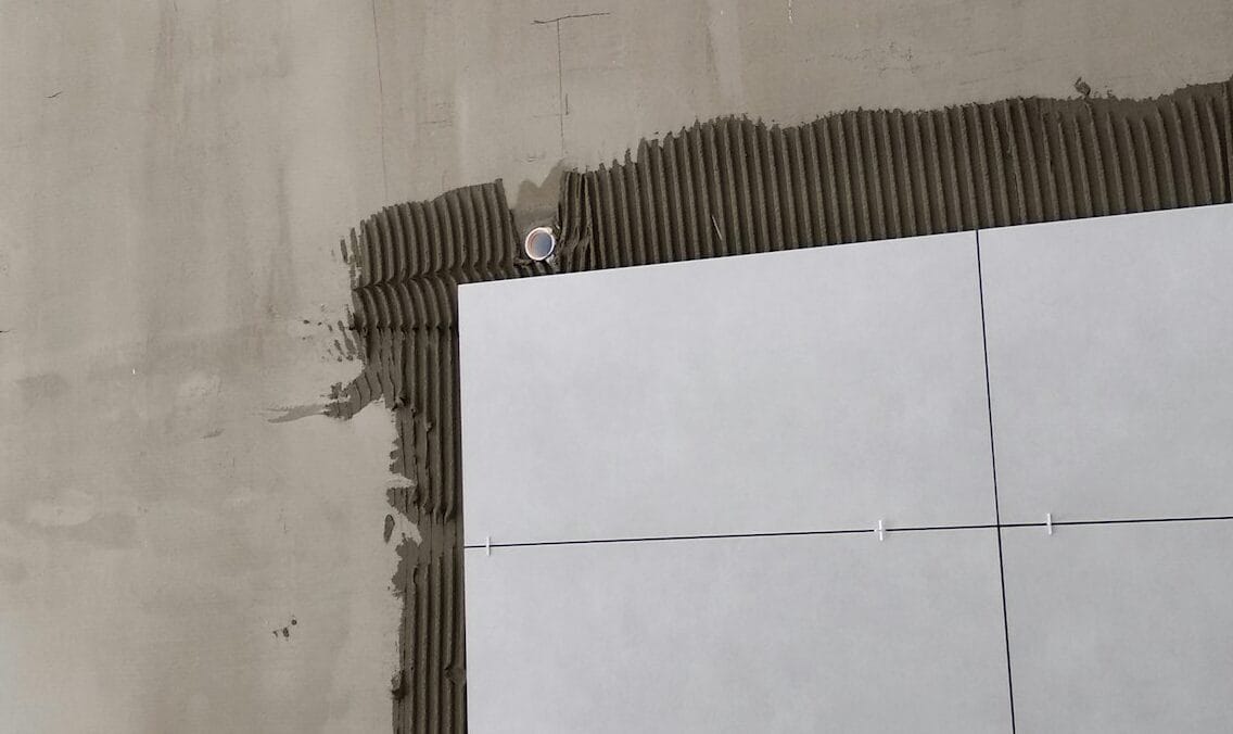 Tile adhesive troweling application